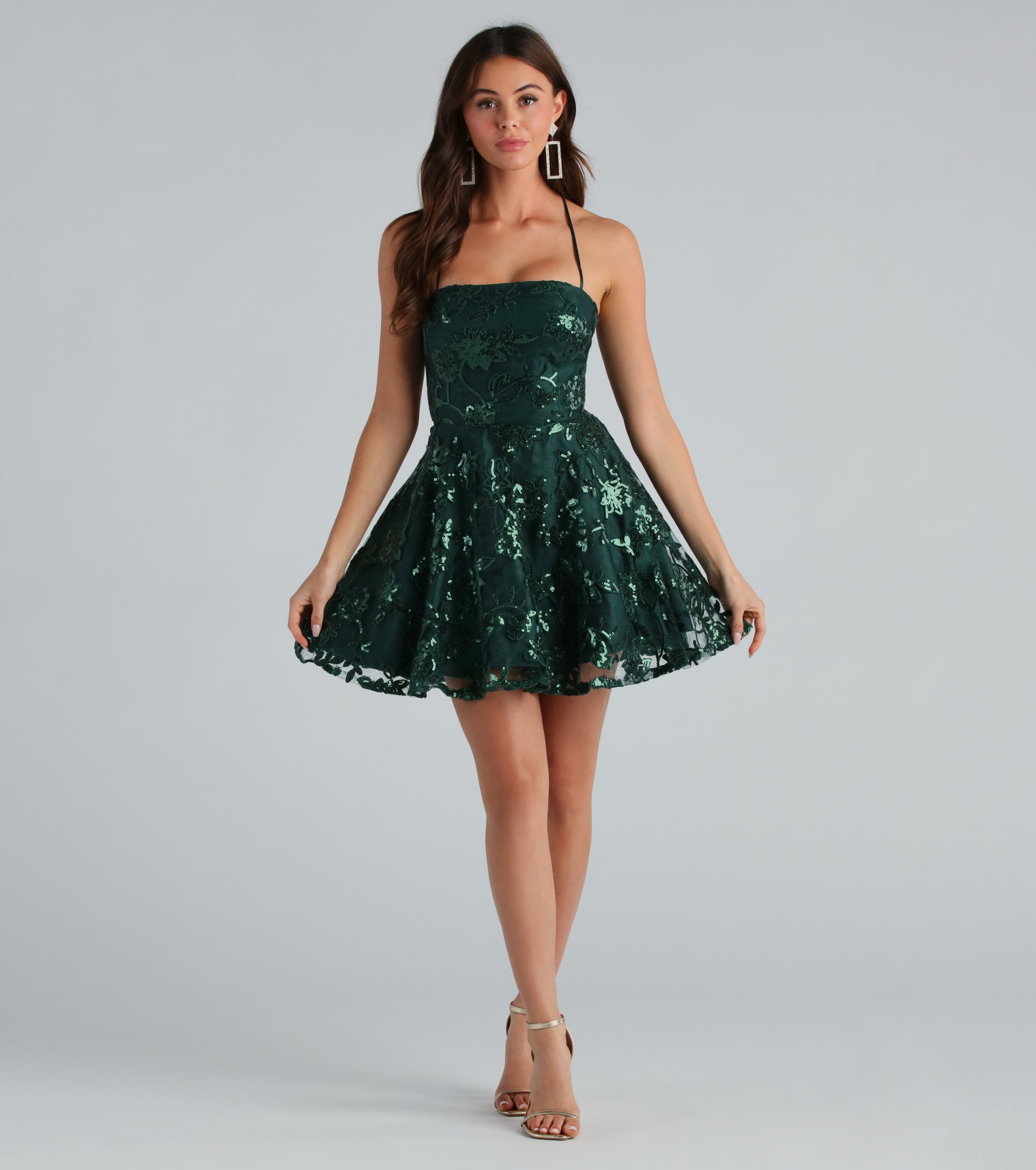 You'll be the best dressed in the Joanna Sequin Lace Party Dress as your summer formal dress with unique details from Windsor.