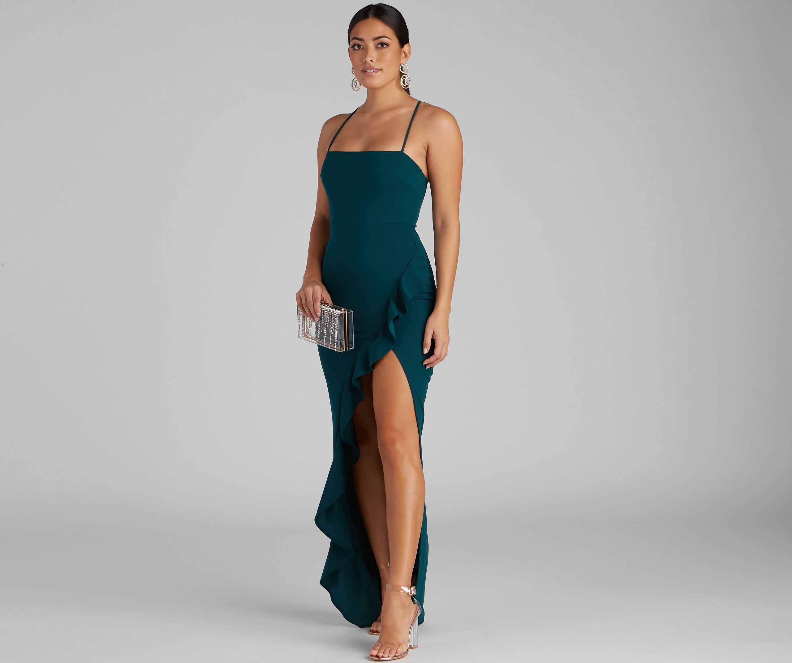 Tiffany Sleeveless High Slit Formal Dress provides a stylish summer wedding guest dress, the perfect dress for graduation, or a cocktail party look in the latest trends for 2024!