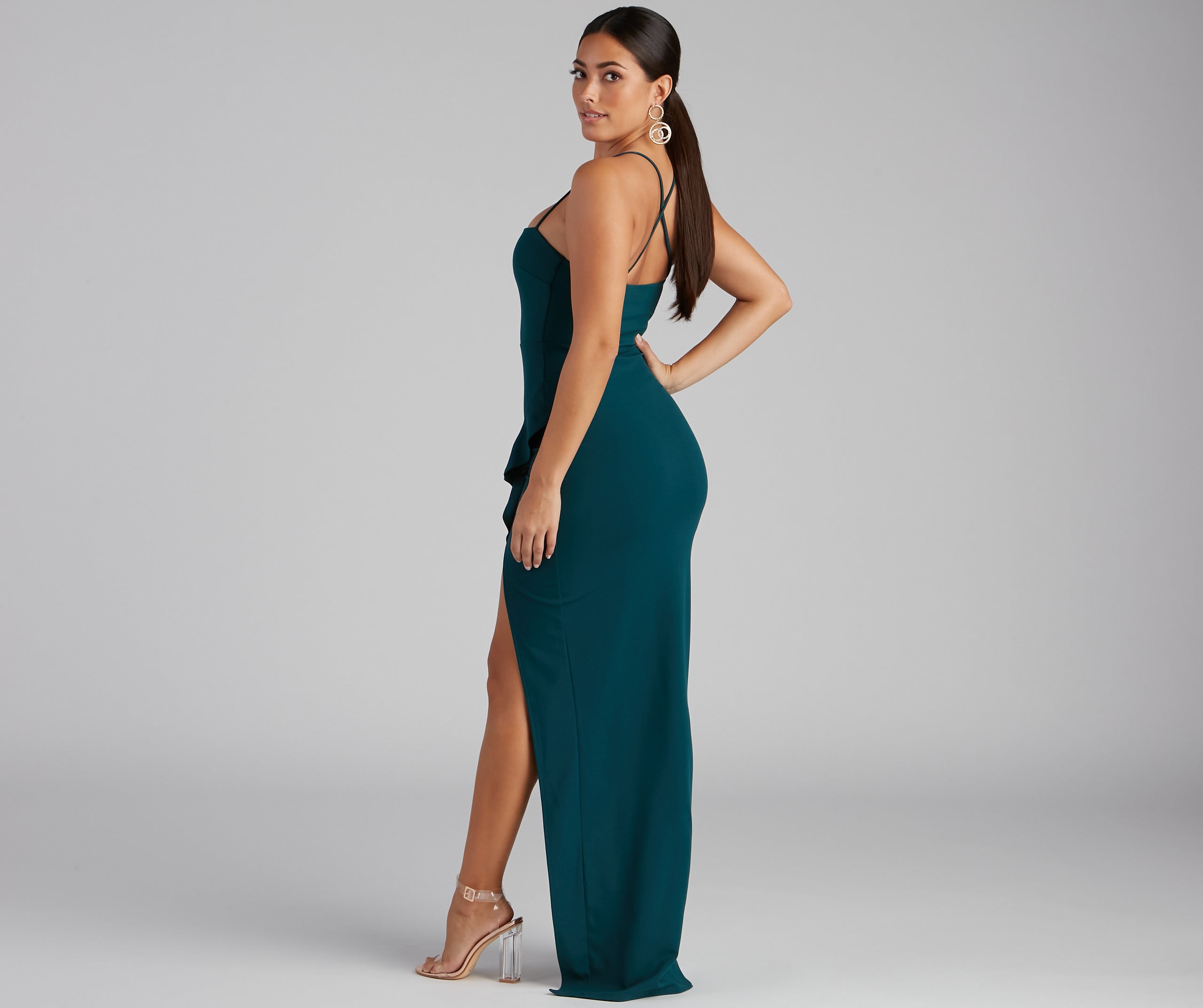 The Tiffany Sleeveless High Slit Formal Dress as your wedding guest dress with a stylish neckline and/or sleeves and elevated details on the back and front will make you the best dressed at any event!