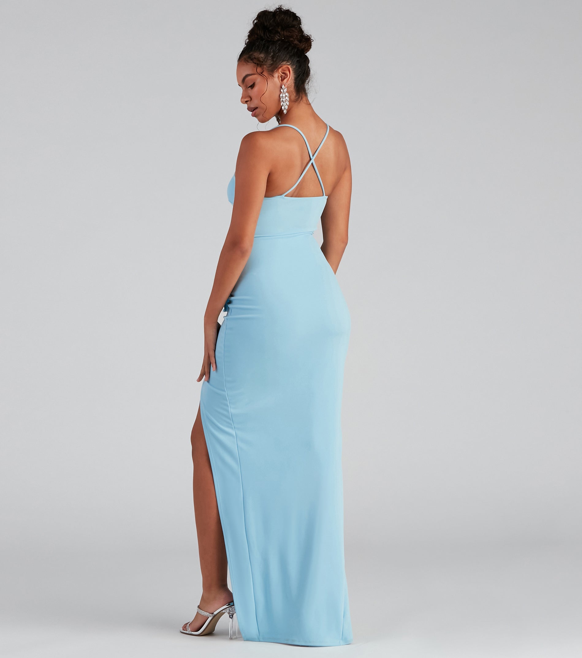 The Tiffany Sleeveless High Slit Formal Dress as your wedding guest dress with a stylish neckline and/or sleeves and elevated details on the back and front will make you the best dressed at any event!