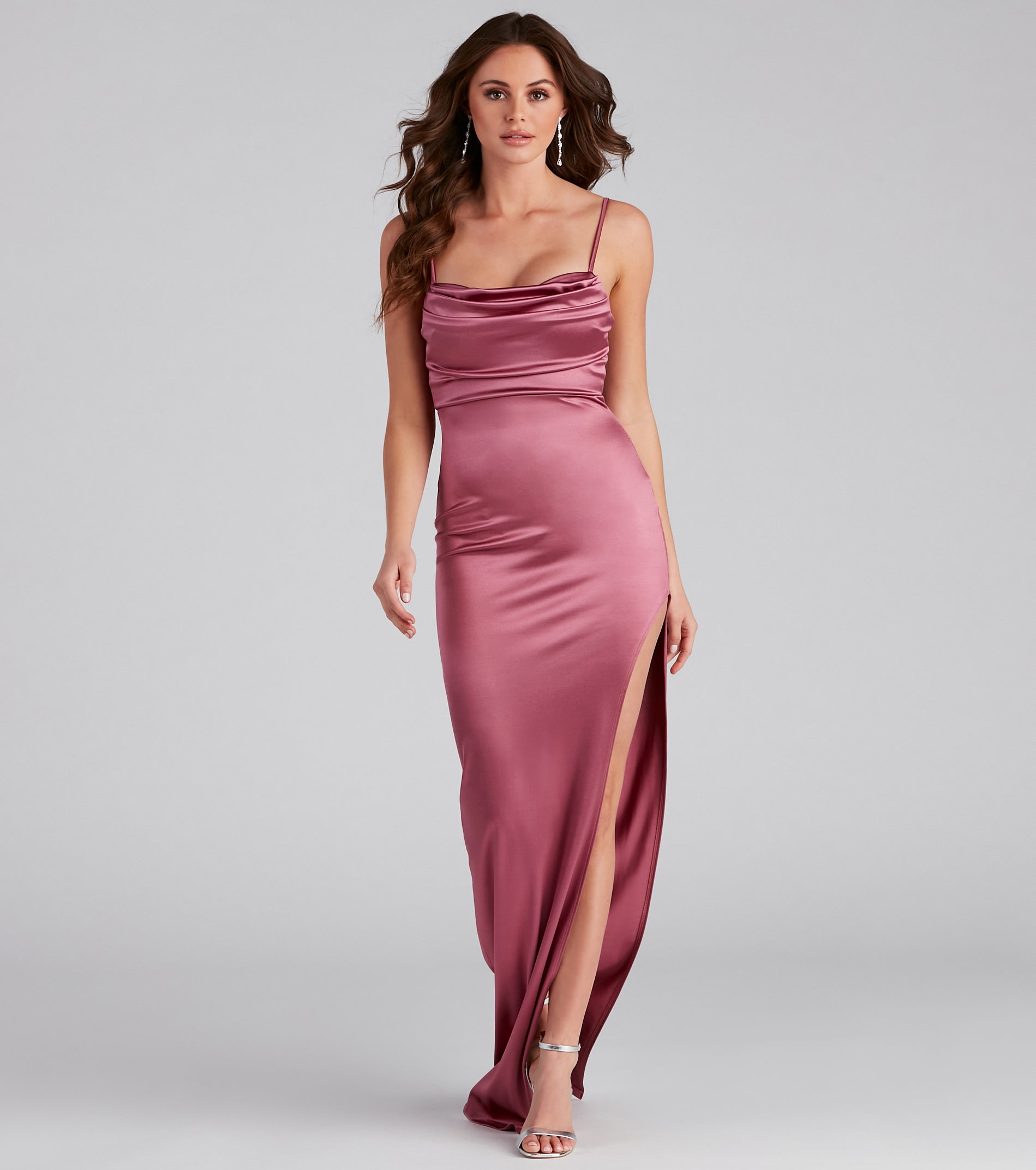 Lola High Slit Satin Dress provides a stylish summer wedding guest dress, the perfect dress for graduation, or a cocktail party look in the latest trends for 2024!