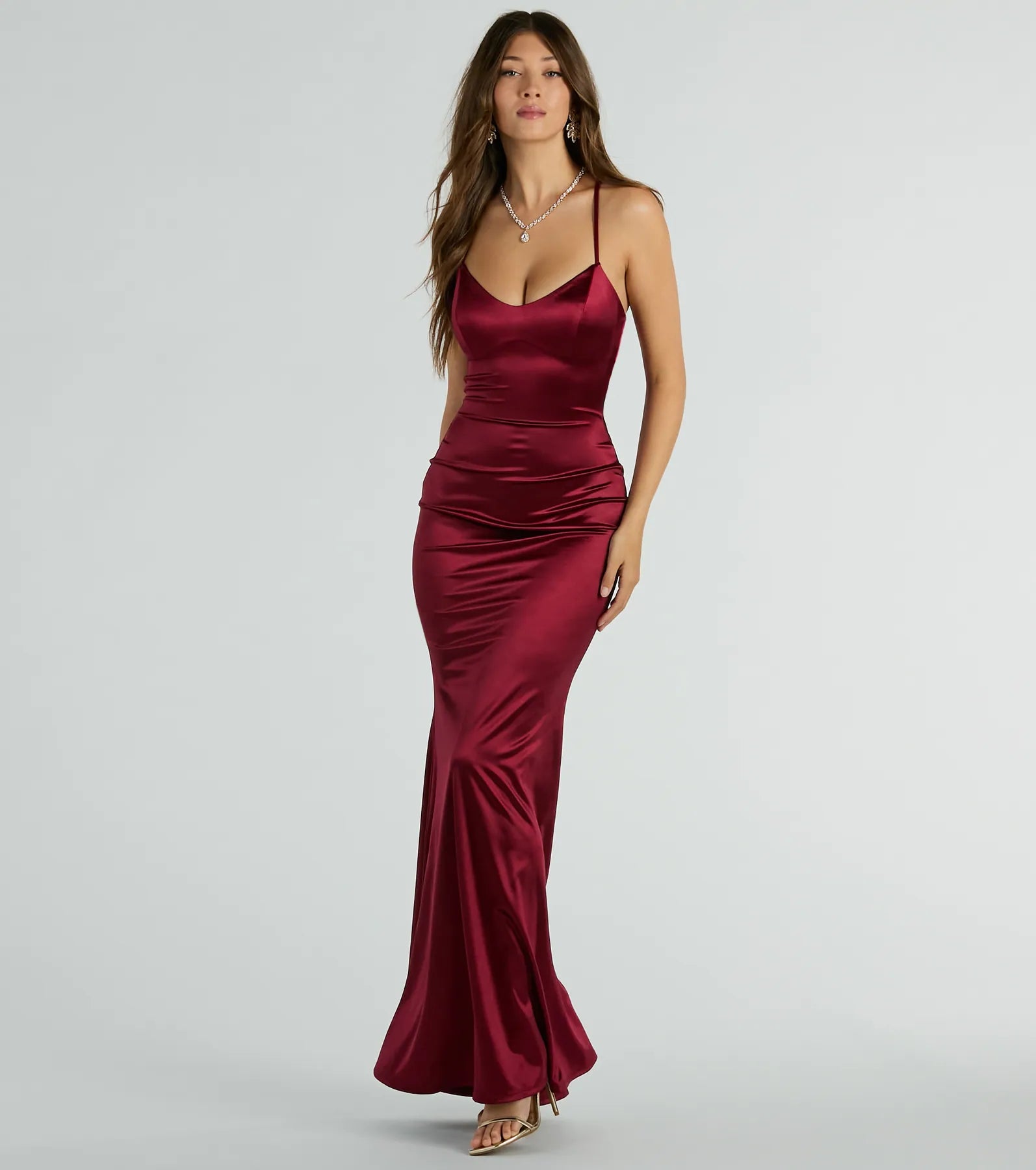 You'll be the best dressed in the Emmie Lace-Up Mermaid Satin Formal Dress as your summer formal dress with unique details from Windsor.