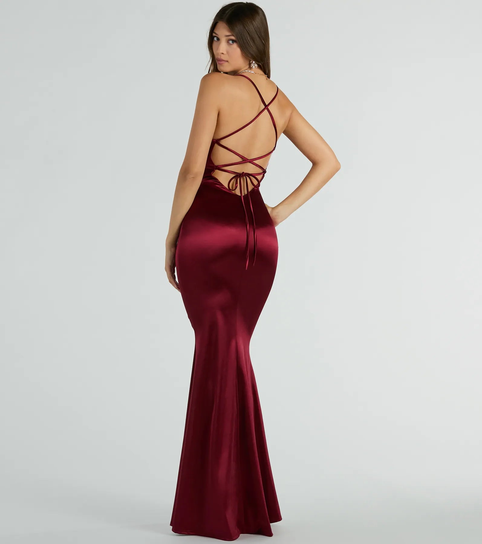 You'll be the best dressed in the Emmie Lace-Up Mermaid Satin Formal Dress as your summer formal dress with unique details from Windsor.