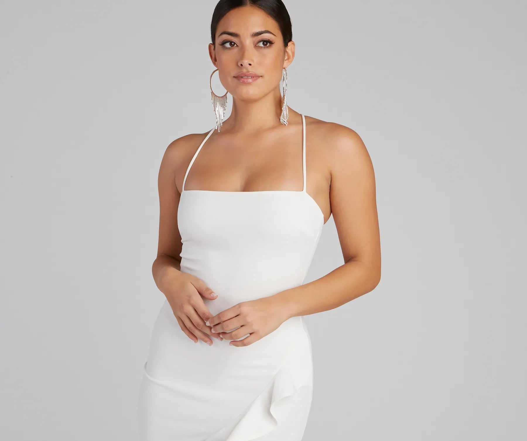 The midi dress length on the Add Some Flair Ruffle Detail Midi Dress provides an elevated silhouette perfect for any party, occasion, or everyday styling.