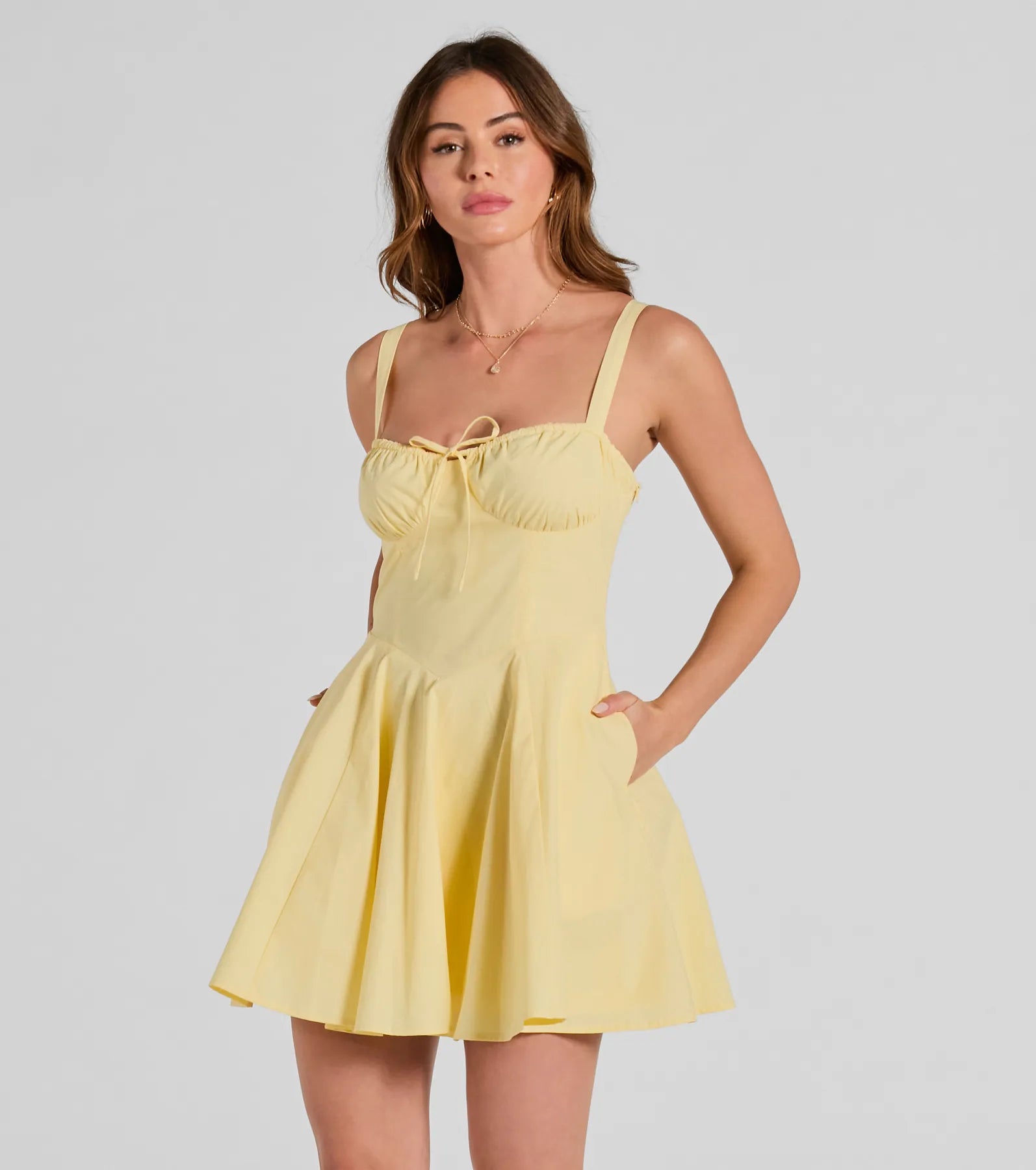 Essential for vacations or summer days, the Ray Of Beauty Lace-Up Corset Skater Dress is a sundress or milkmaid dress with sleek and flirty details.