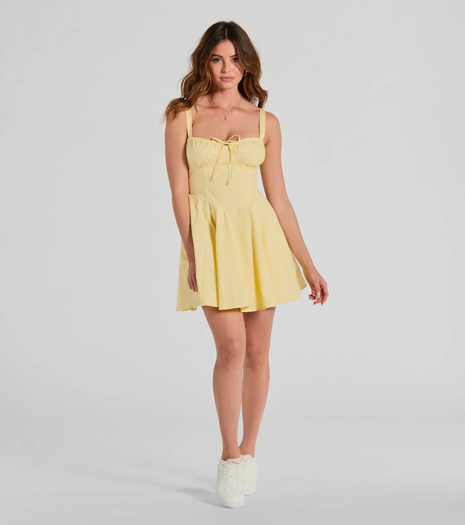 Essential for vacations or summer days, the Ray Of Beauty Lace-Up Corset Skater Dress is a sundress or milkmaid dress with sleek and flirty details.