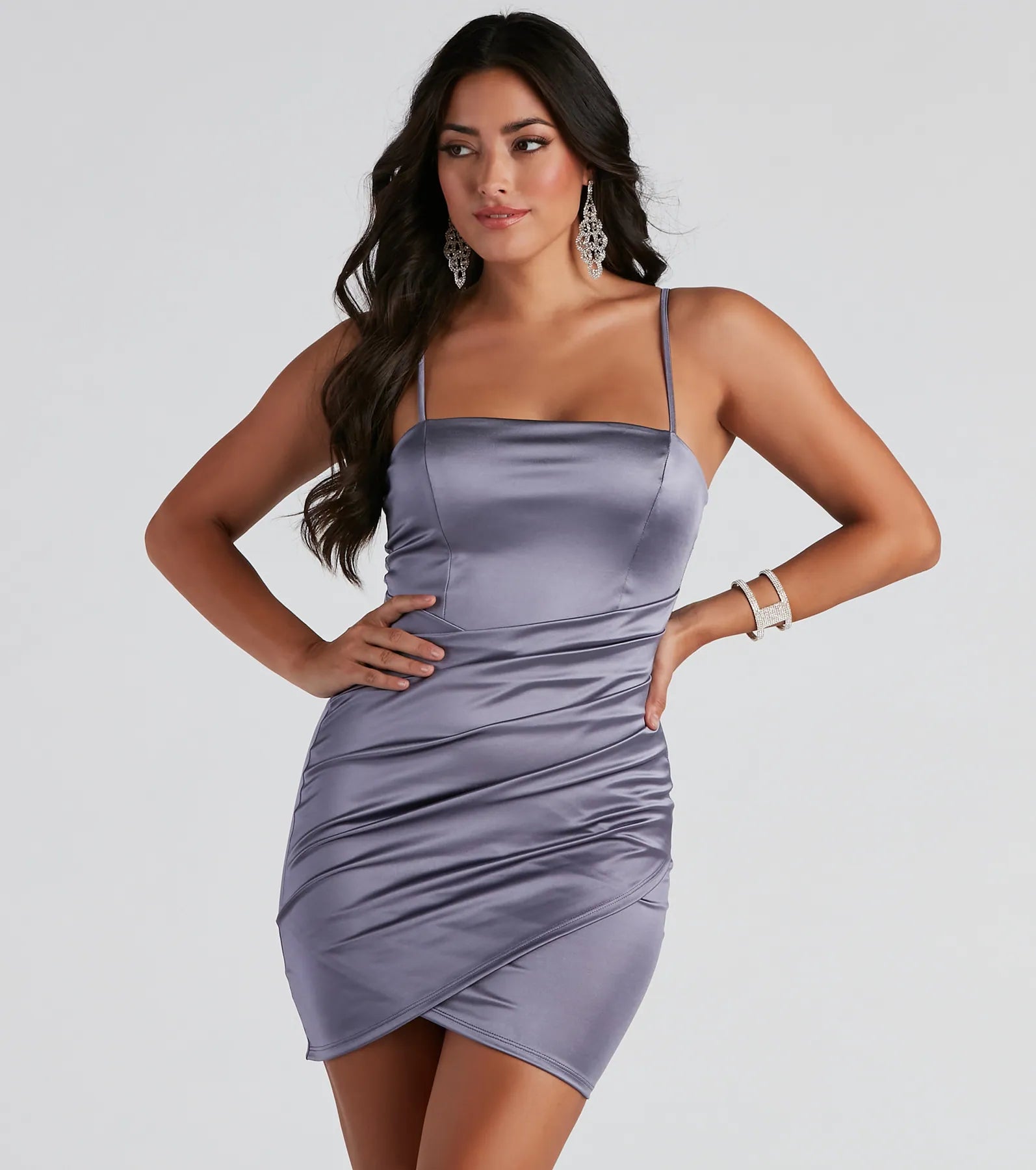 Level up your club dress with the Wrapped In Stylish Satin Mini Dress to create a trendy Vegas outfit or nightclub dress with the hottest details!