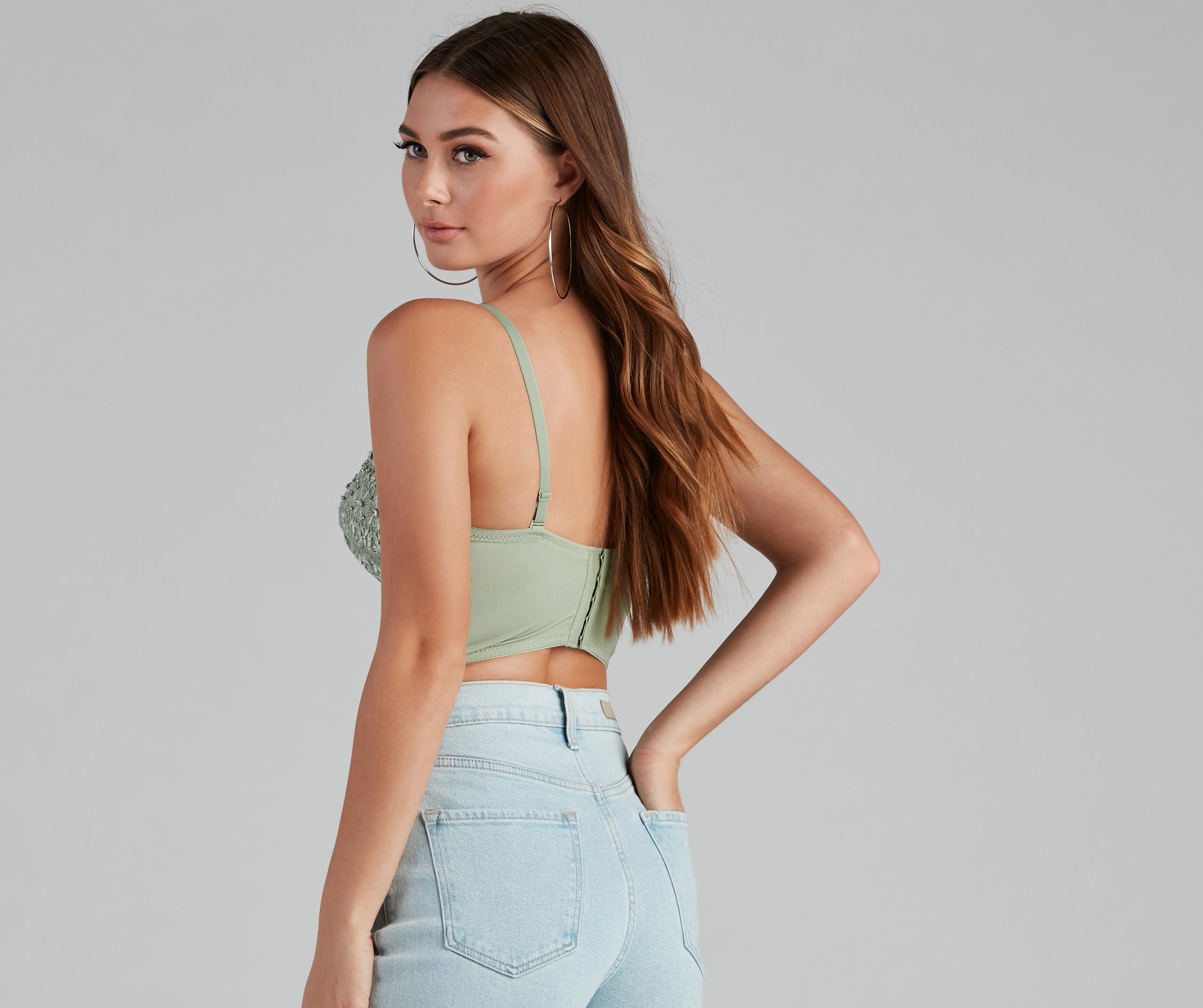 The waist-defining bodice style of the Reigning Lace Bustier Top is perfect for making a statement with your outfit and provides the boning, molded cups, or lace-up details that capture the corset trend.