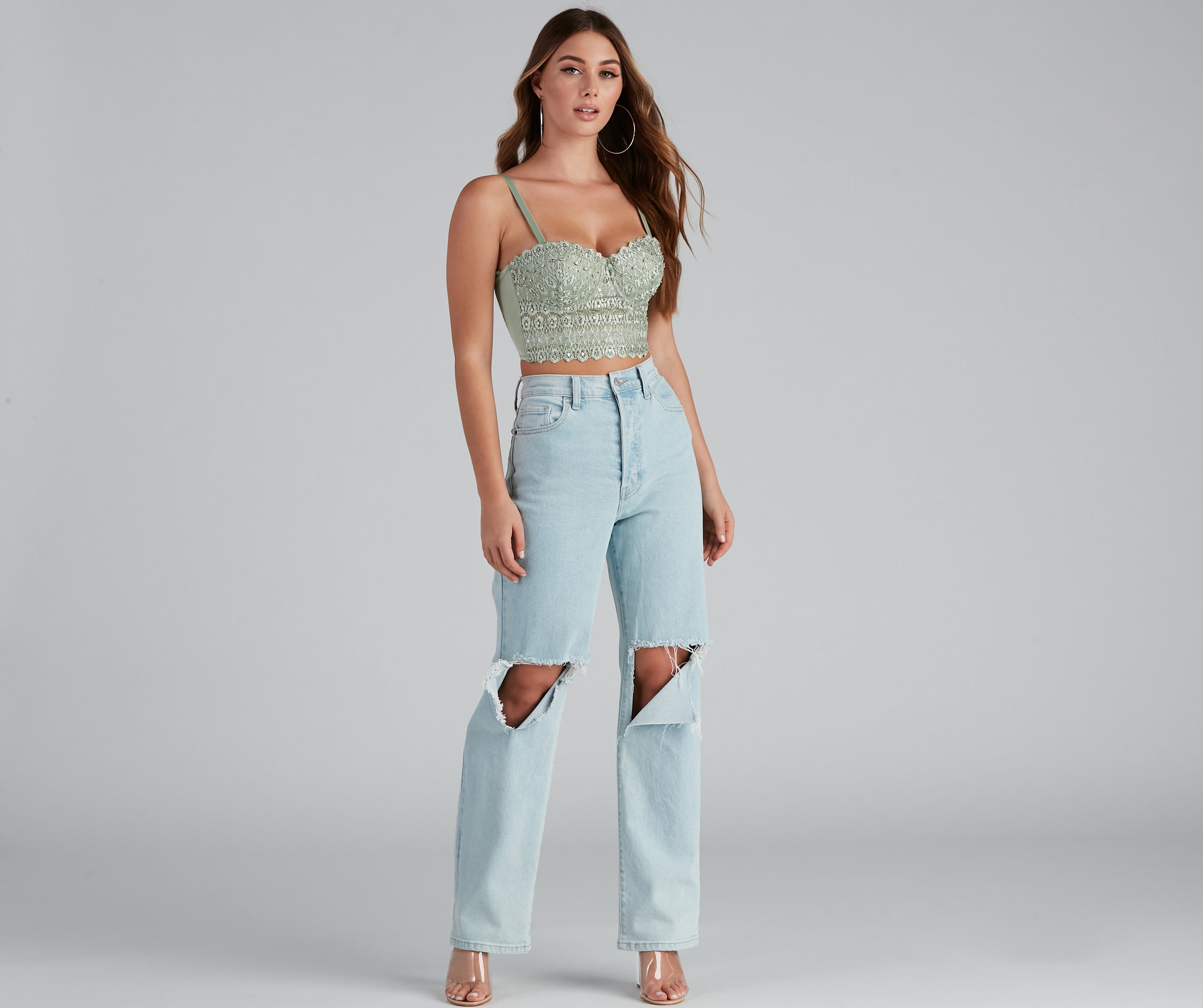 The waist-defining bodice style of the Reigning Lace Bustier Top is perfect for making a statement with your outfit and provides the boning, molded cups, or lace-up details that capture the corset trend.