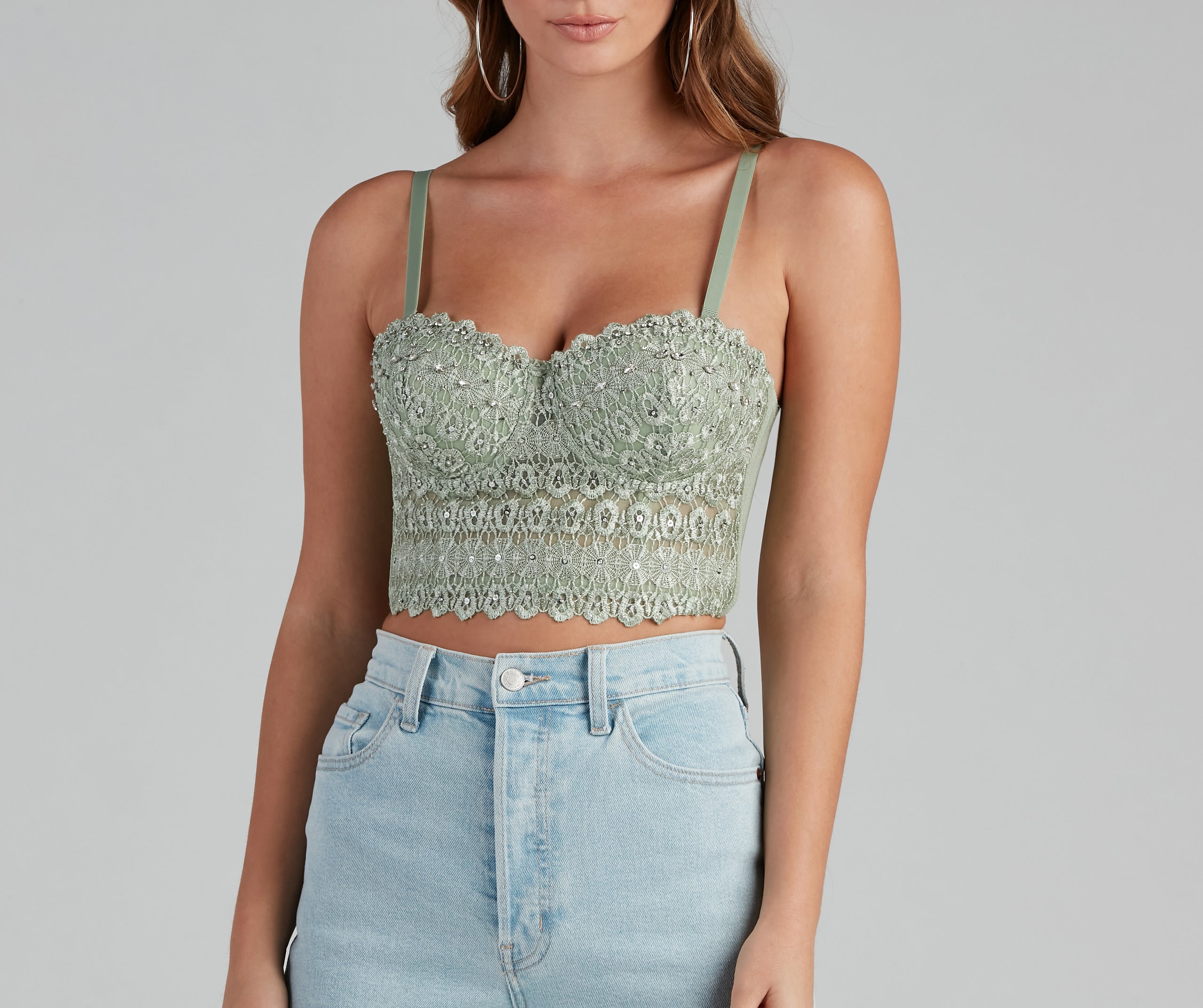 The waist-defining bodice style of the Reigning Lace Bustier Top is perfect for making a statement with your outfit and provides the boning, molded cups, or lace-up details that capture the corset trend.