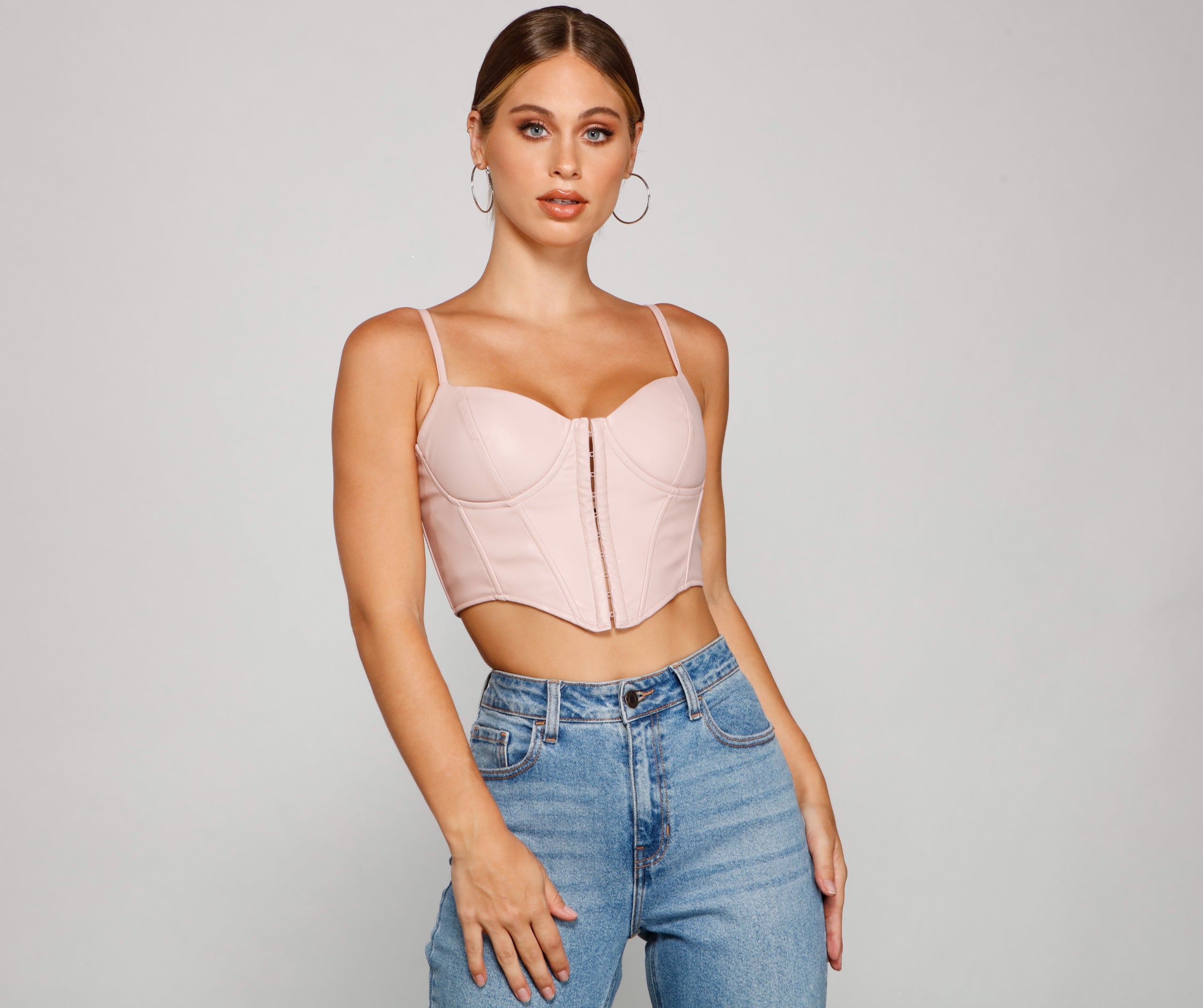 With fun and flirty details, the Bold Moment Faux Leather Corset Top shows off your unique style for a trendy outfit for summer!