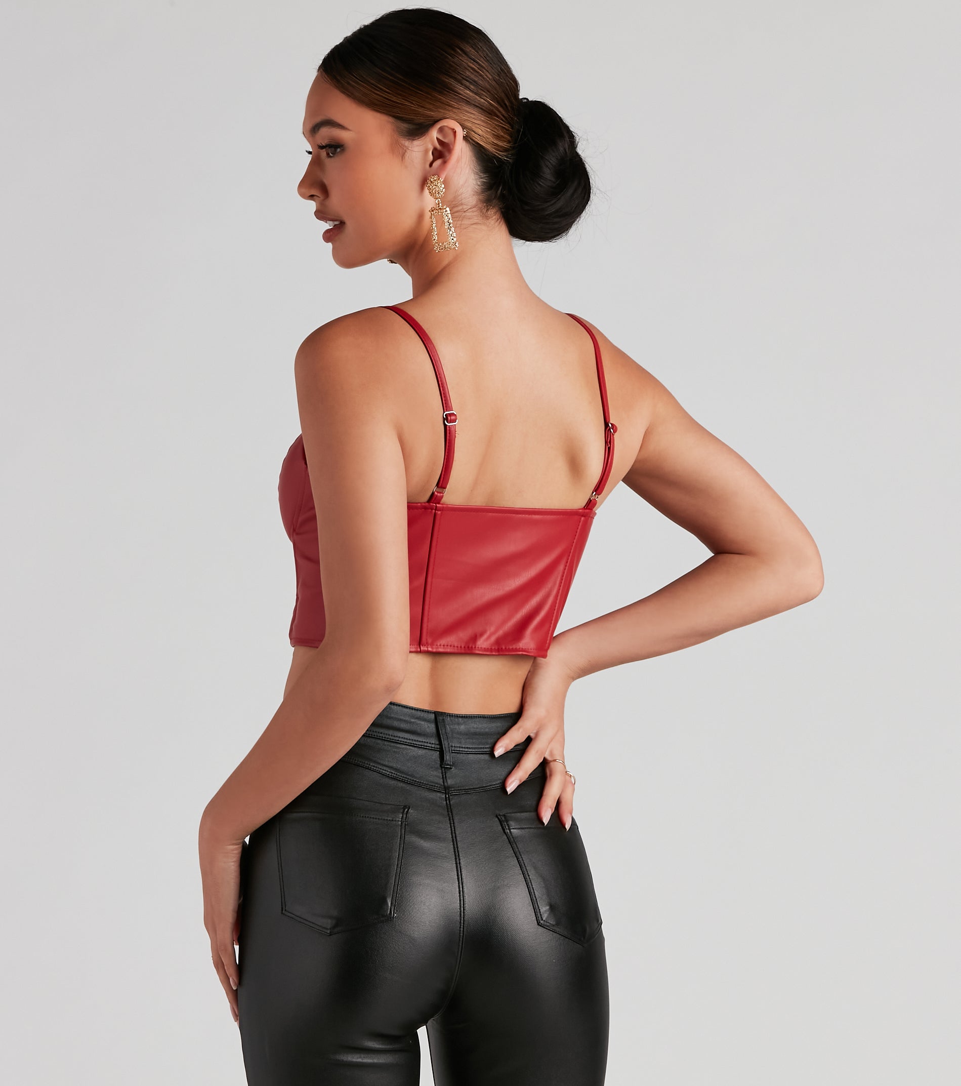 The waist-defining bodice style of the Bold Moment Faux Leather Corset Top is perfect for making a statement with your outfit and provides the boning, molded cups, or lace-up details that capture the corset trend.