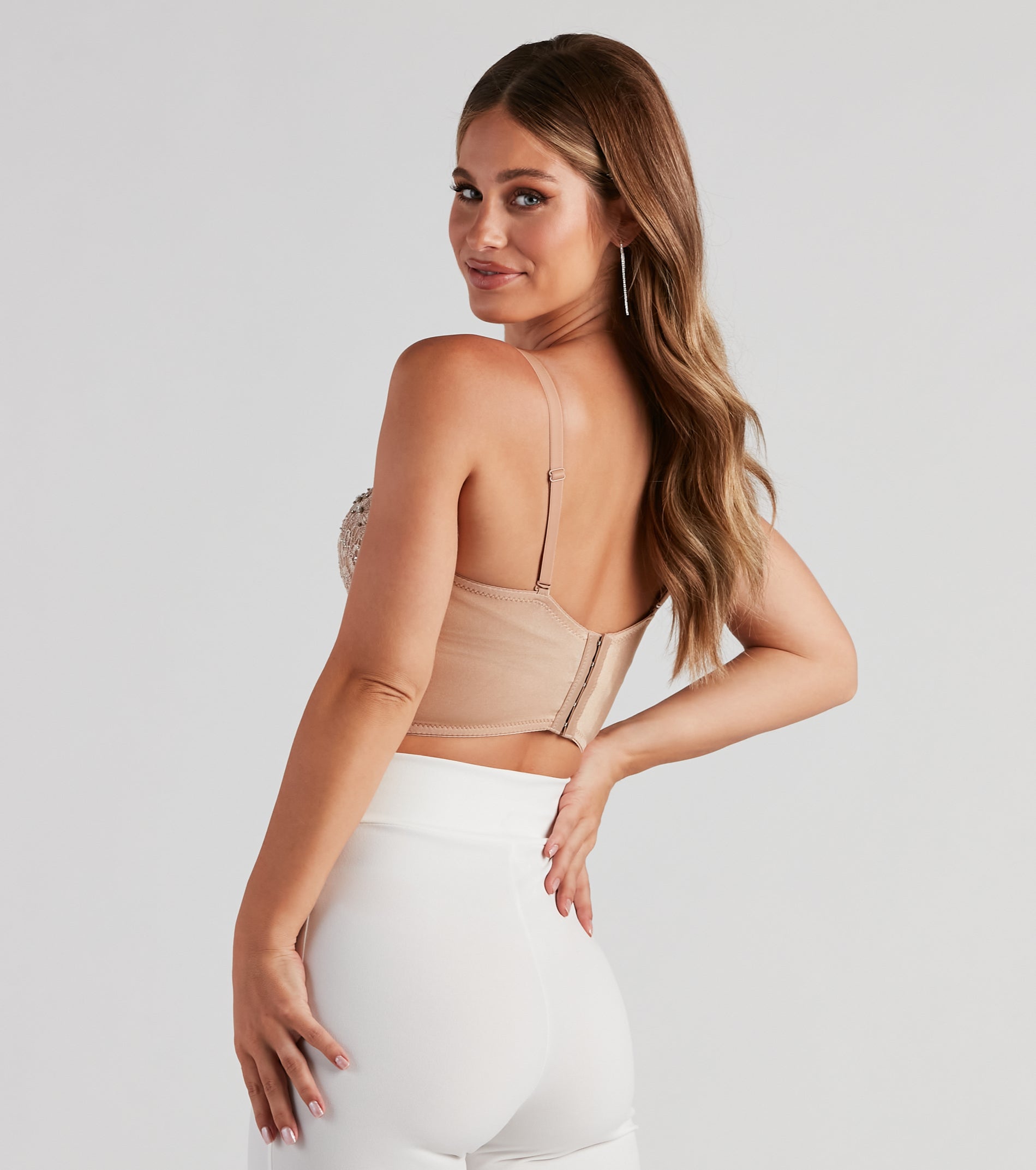 The waist-defining bodice style of the Reigning Lace Bustier Top is perfect for making a statement with your outfit and provides the boning, molded cups, or lace-up details that capture the corset trend.