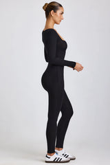 Gerippter, langärmliger Jumpsuit aus Modal in Schwarz