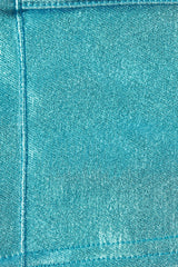 Kurzes Top aus Metallic-Denim mit Gürtel in Aqua