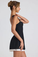 Bow-Embellished Pleated A-Line Mini Dress in Black