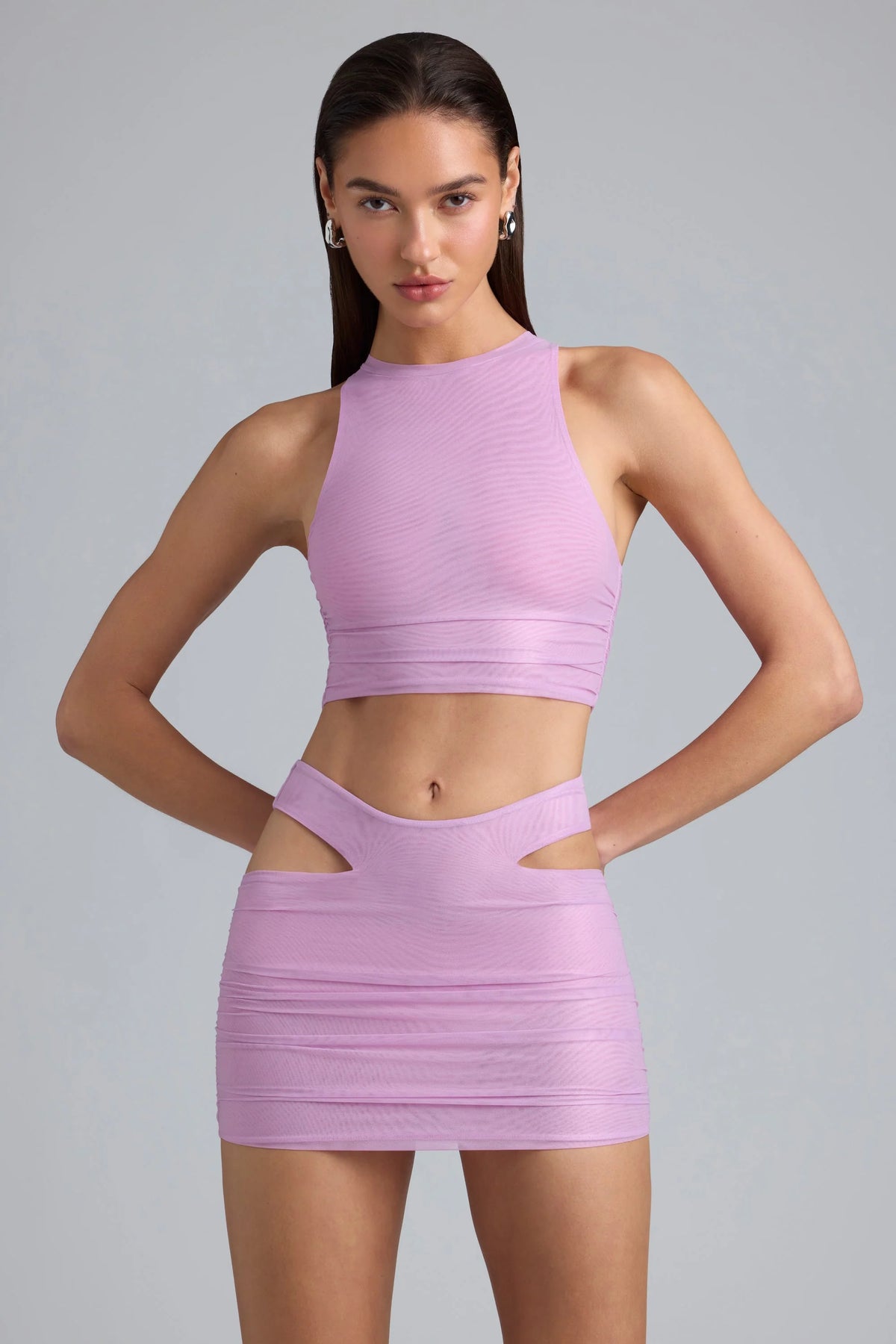 Metallic-Top mit Rüschen und hohem Kragen in Violett-Pink