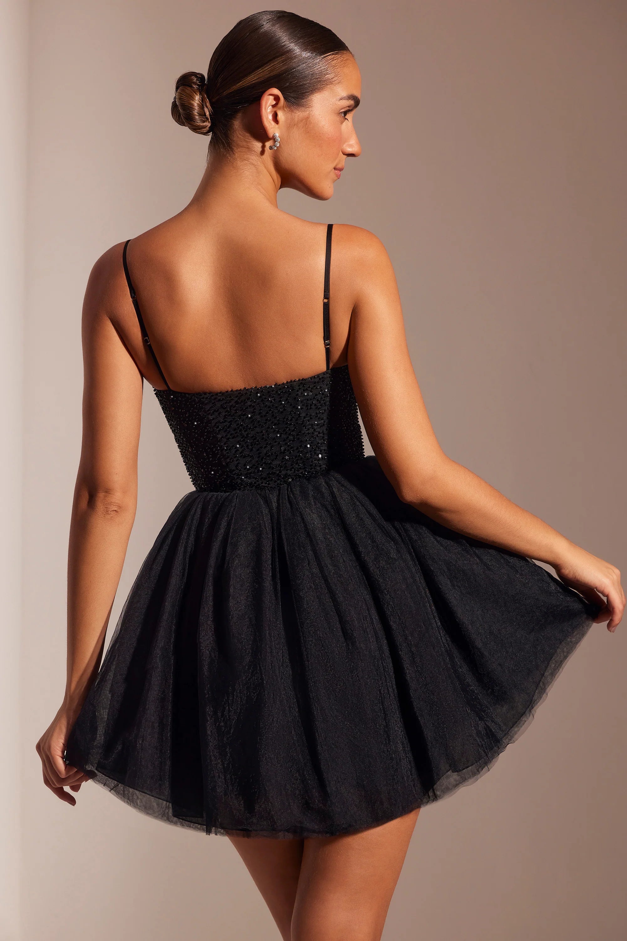 Mini abito con gonna in tulle con corsetto decorato in nero