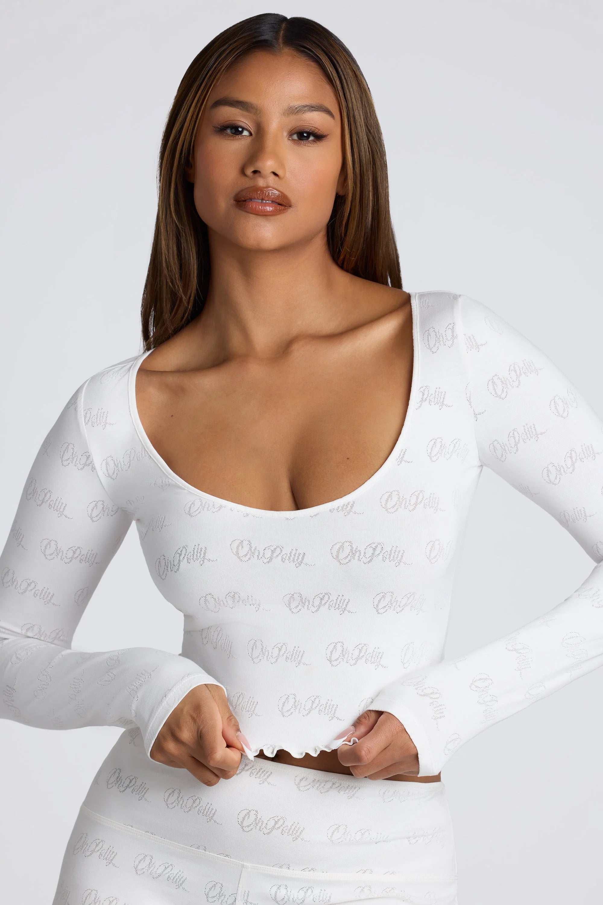 Long Sleeve Scoop Neck Pointelle Crop Top in White