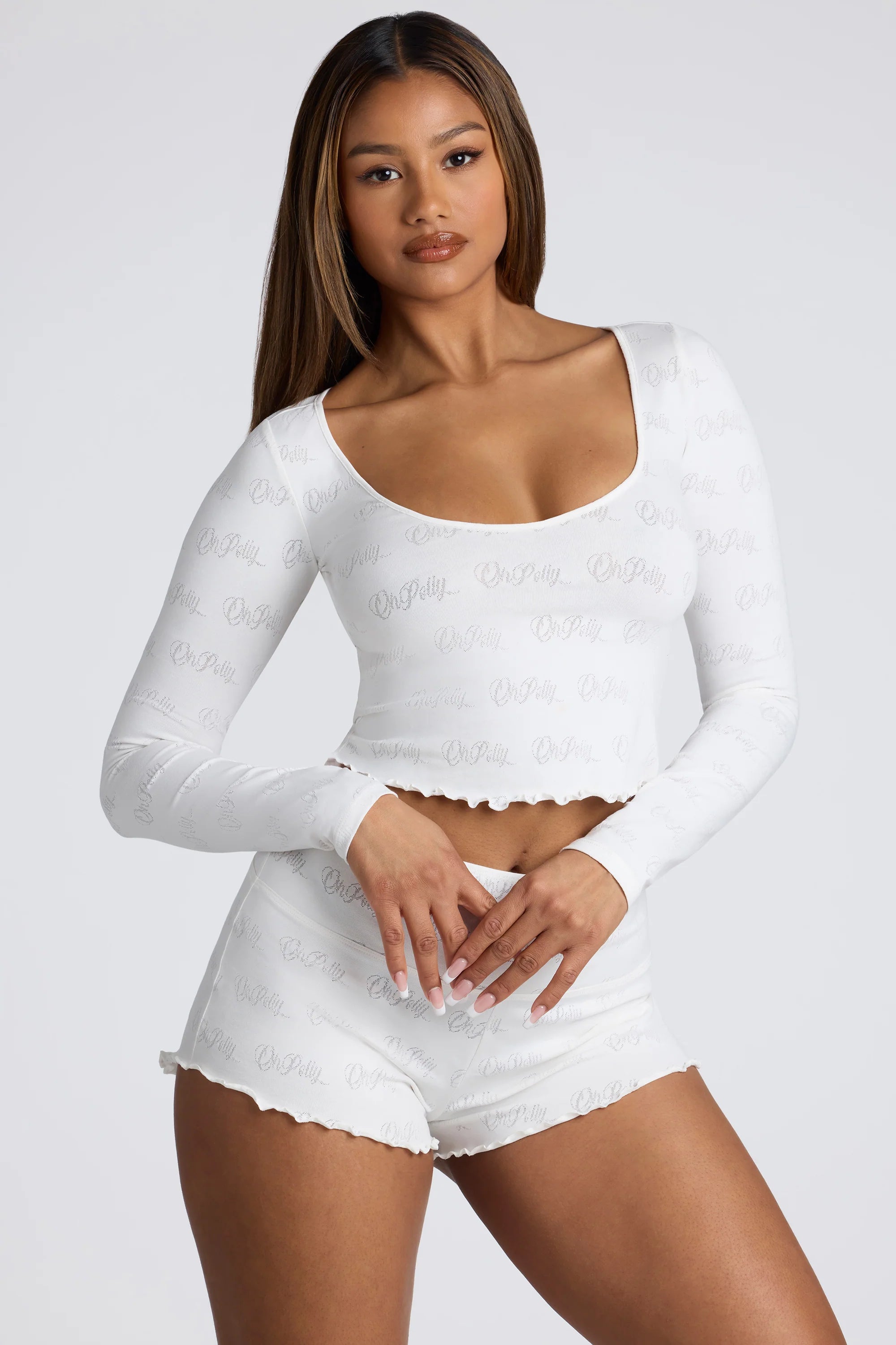 Long Sleeve Scoop Neck Pointelle Crop Top in White