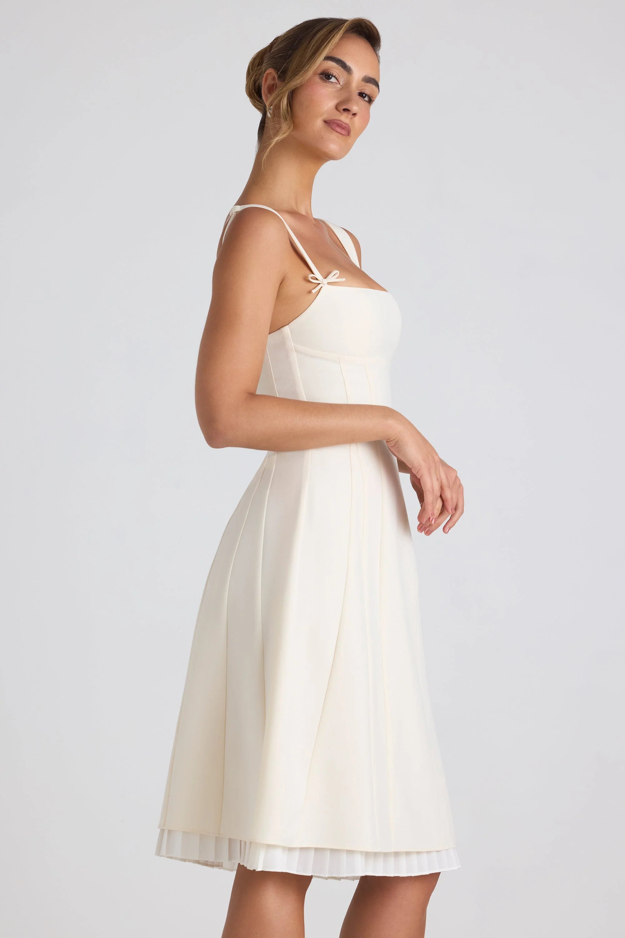 Bow-Embellished Pleated A-Line Midi Dress in Ivory