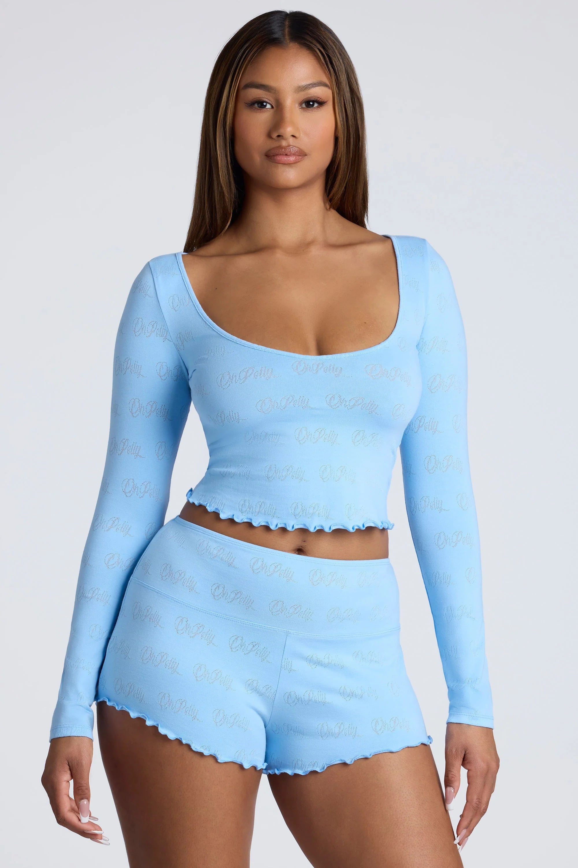 Long Sleeve Scoop Neck Pointelle Crop Top in Baby Blue