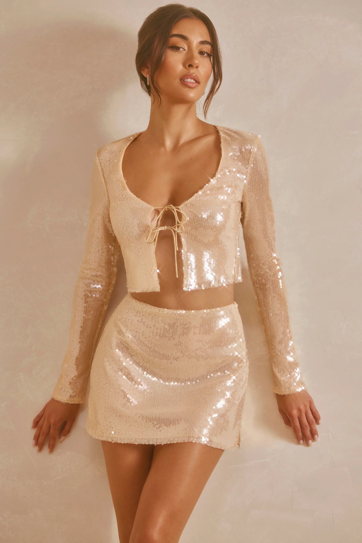 Sheer Sequin Long Sleeve Tie Front Crop Top in Tan