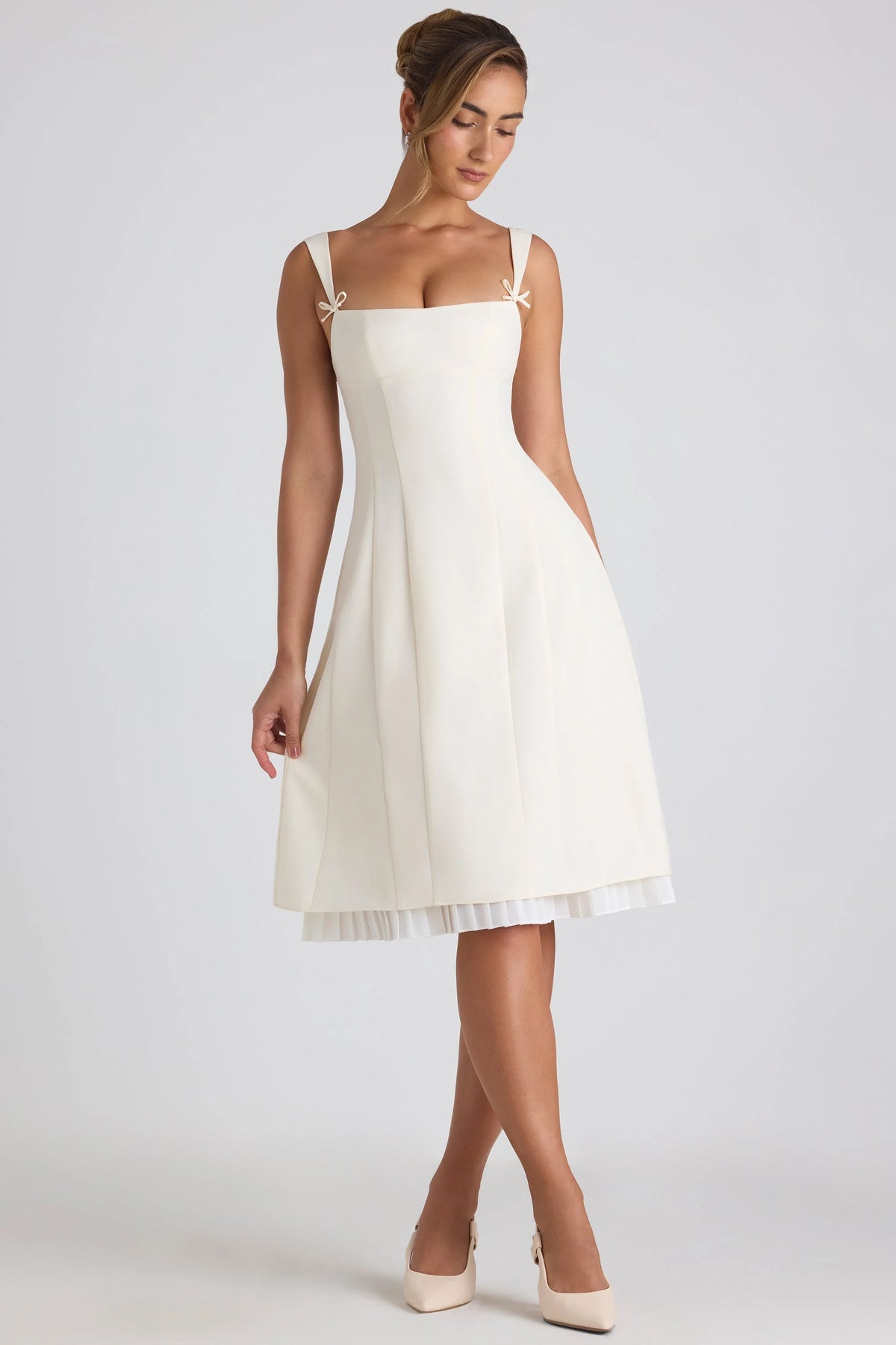 Bow-Embellished Pleated A-Line Midi Dress in Ivory