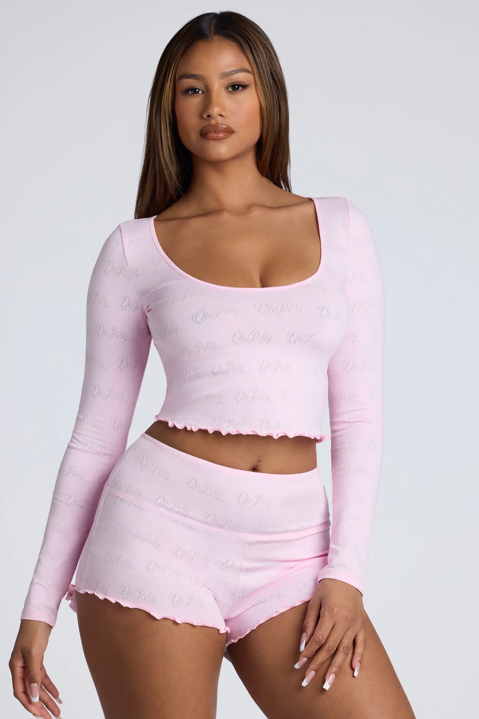 Long Sleeve Scoop Neck Pointelle Crop Top in Baby Pink