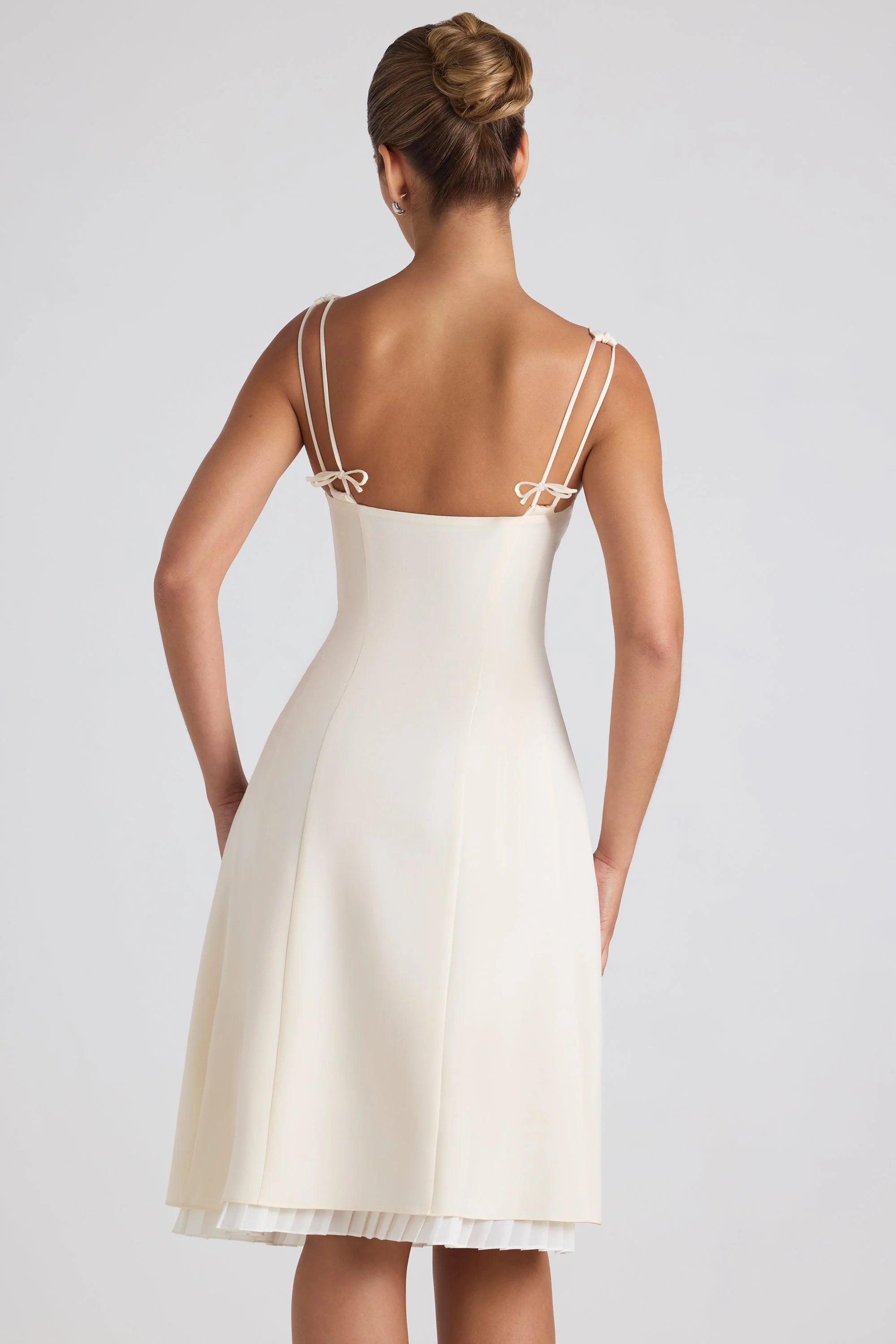 Bow-Embellished Pleated A-Line Midi Dress in Ivory