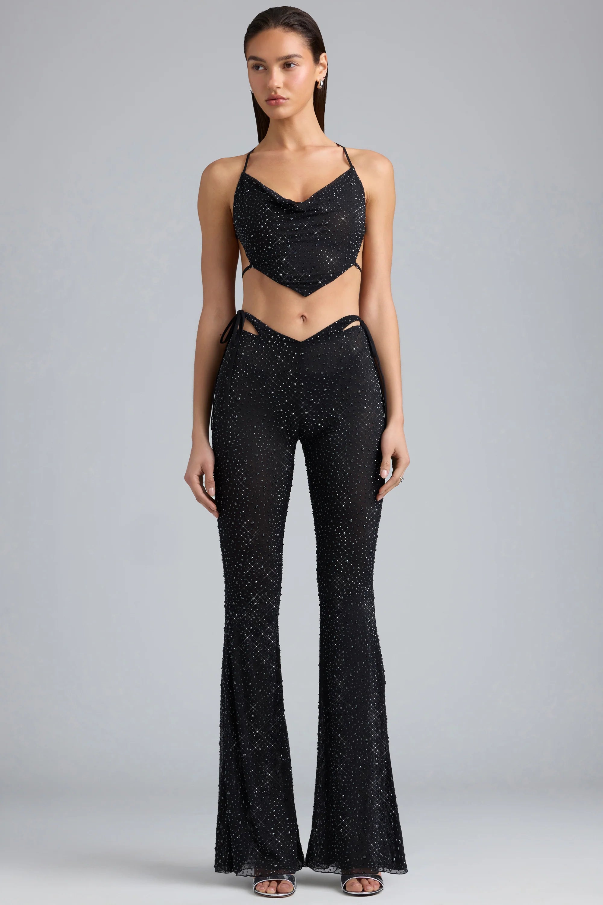 Embellished Cut-Out Flared Trousers in Black