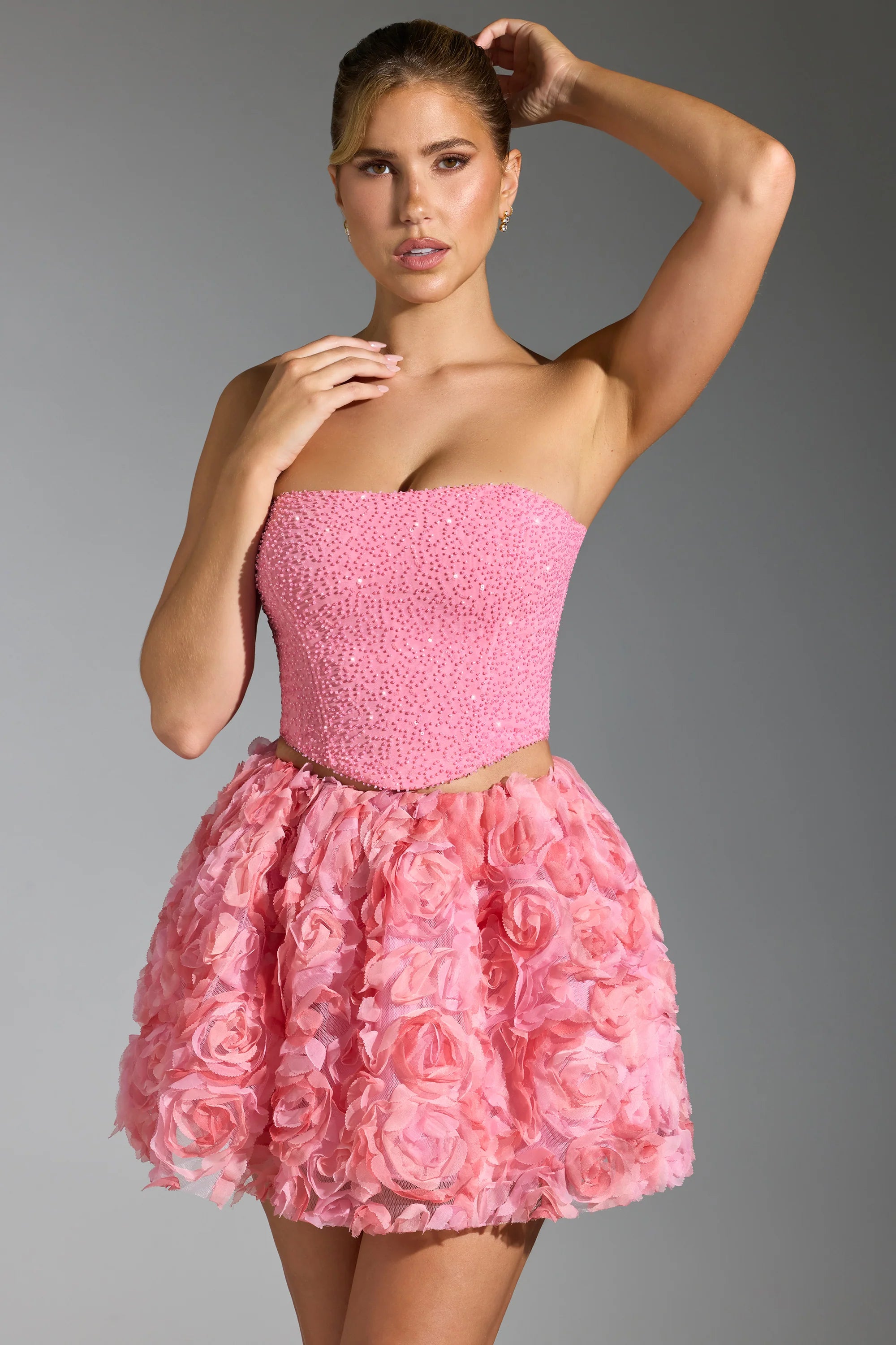 Top a corsetto decorato in rosa