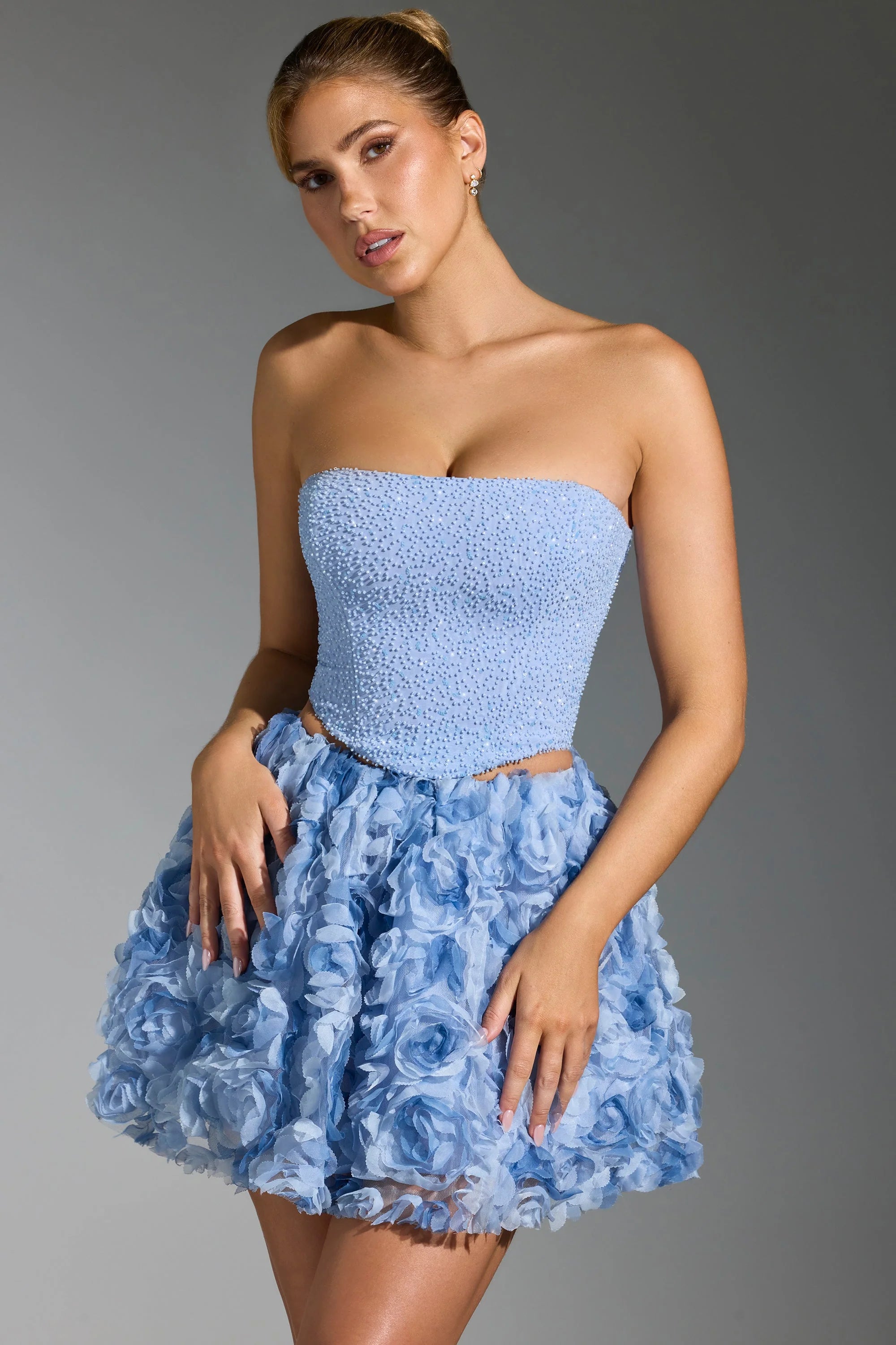 Top a corsetto decorato in blu