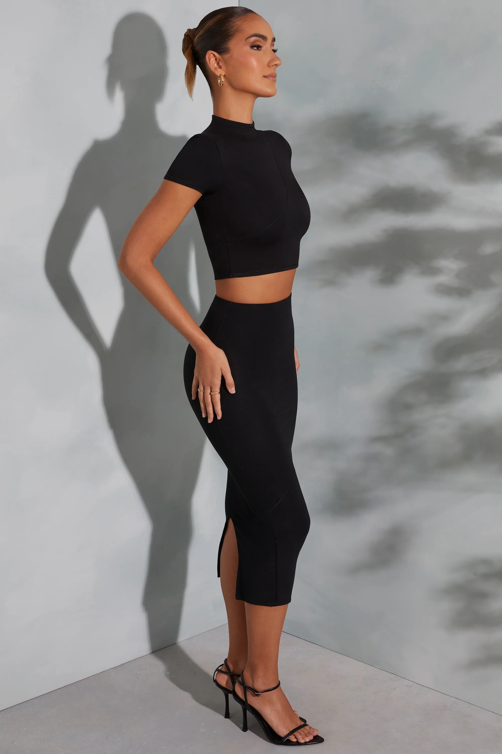 Contrast Stitch Turtleneck Crop Top in Black