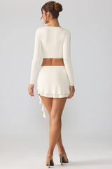 Slinky Jersey Mid Rise Ruffle Layer Mini Skirt in Ivory