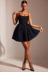 Mini abito con gonna in tulle con corsetto decorato in nero